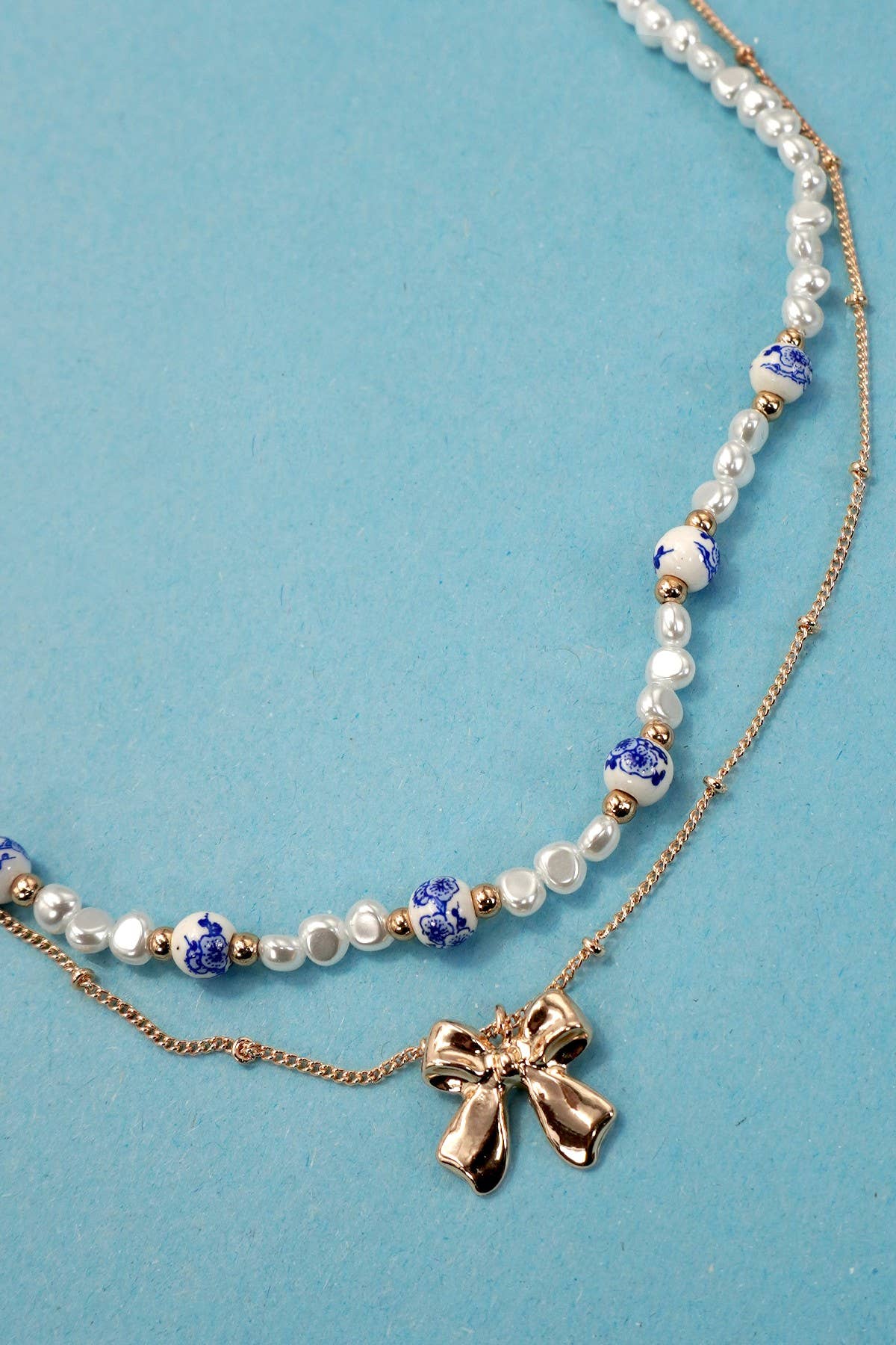Porcelain Pearl + Gold Bow Necklace