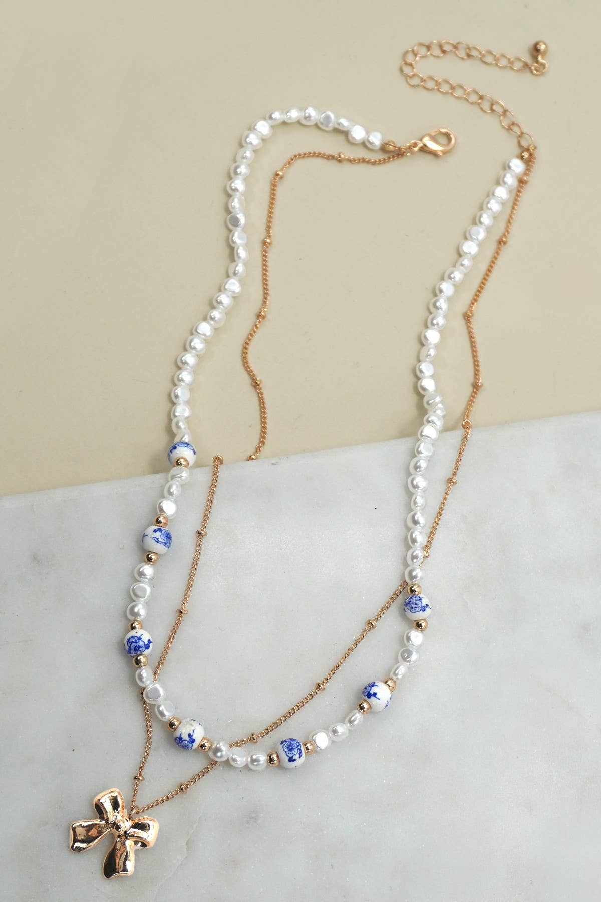 Porcelain Pearl + Gold Bow Necklace