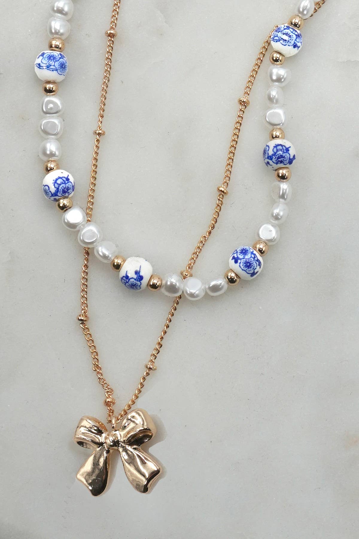Porcelain Pearl + Gold Bow Necklace