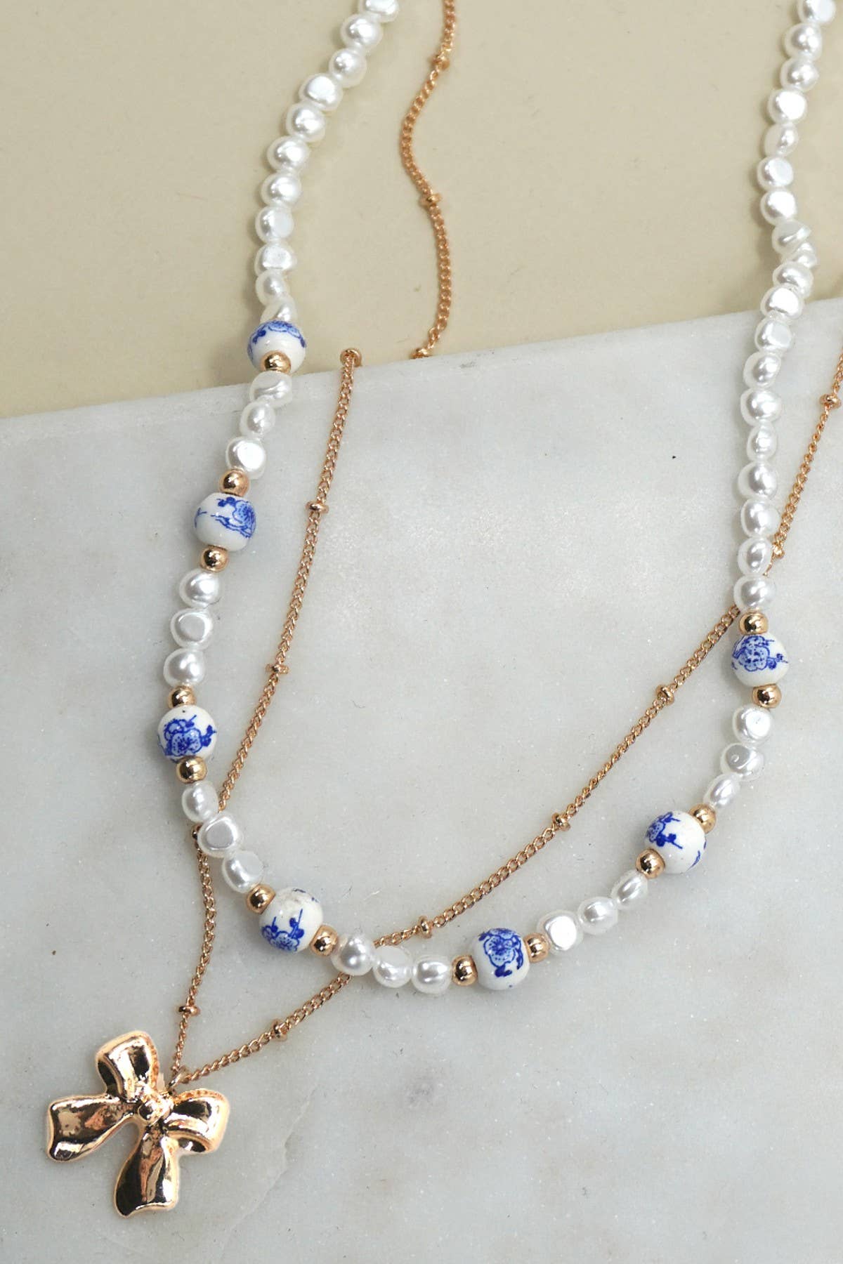 Porcelain Pearl + Gold Bow Necklace