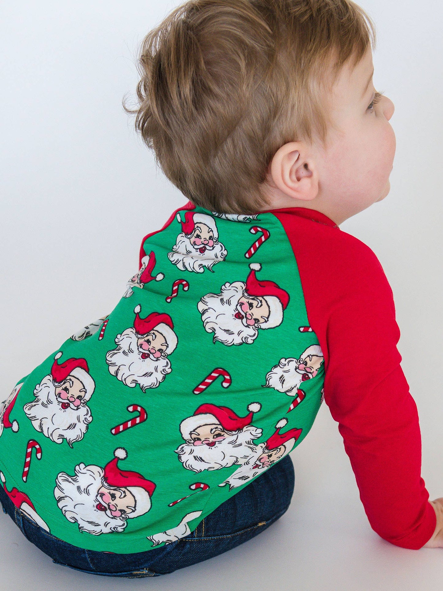 Green Santa Joy Long Sleeve Raglan Henley Tee