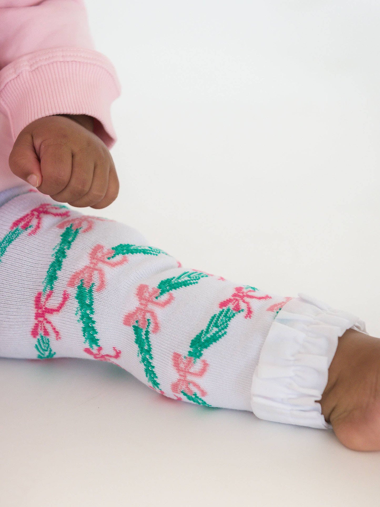 Mistletoe Bow Bubble Romper + Tinsel Tidings Footless Ruffle Tights