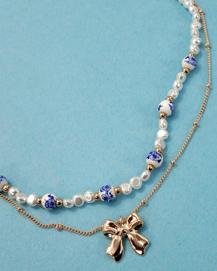 Porcelain Pearl + Gold Bow Necklace