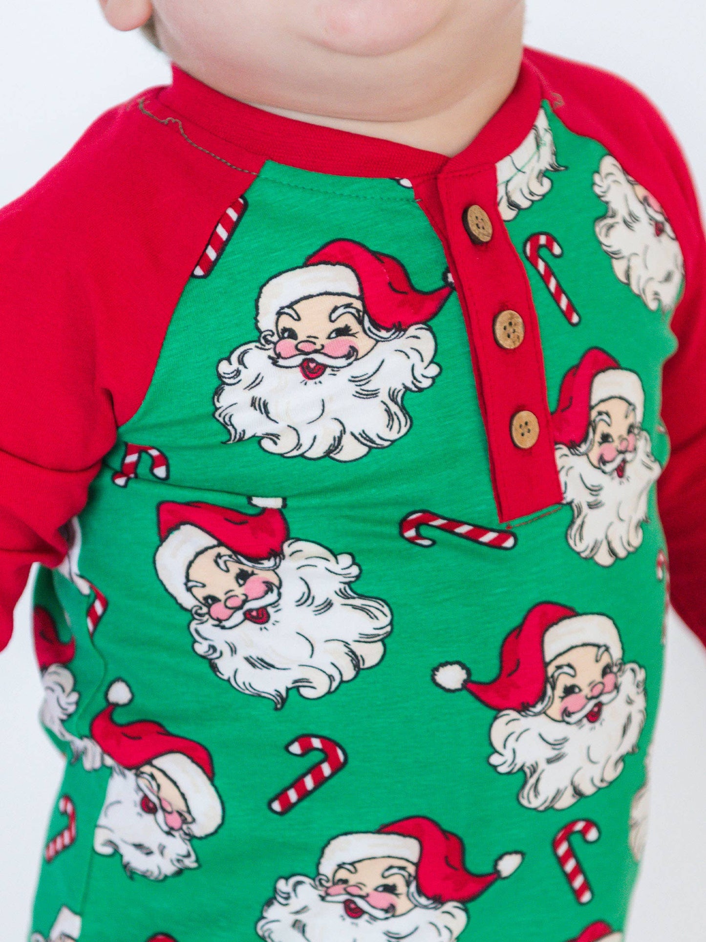 Green Santa Joy Long Sleeve Raglan Henley Tee