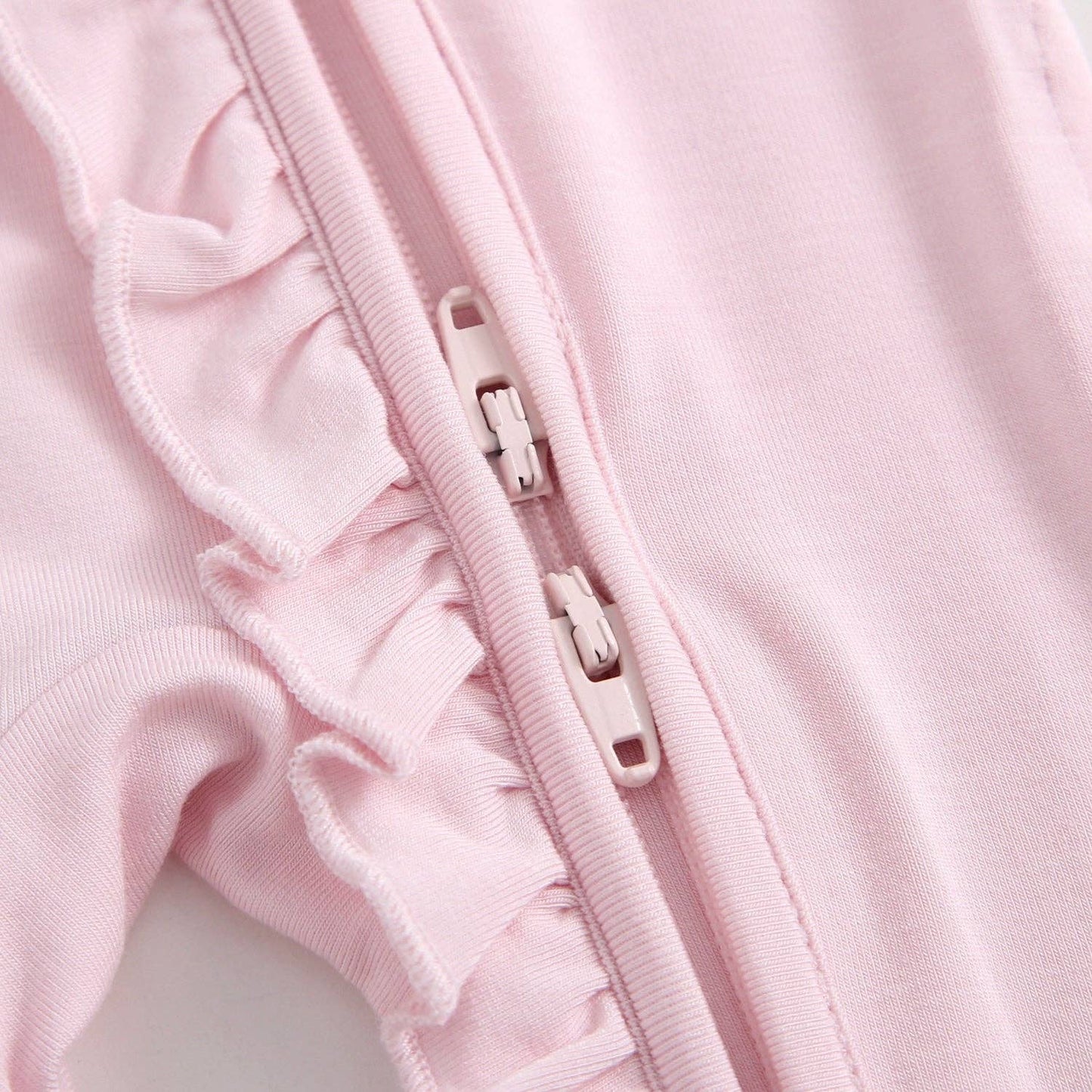 Dawn Ruffled Zippered Baby Romper | Pink