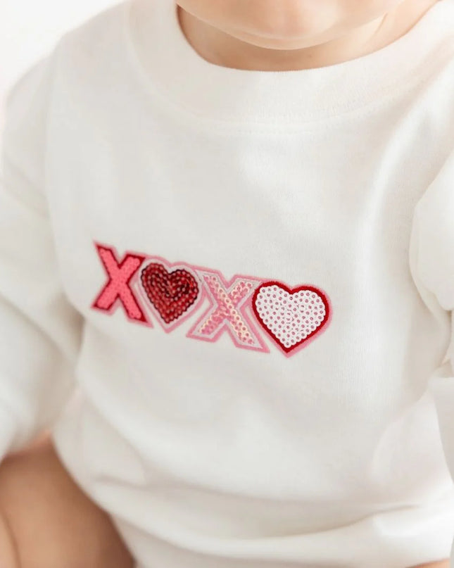 XOXO Sequin Patch Long Sleeve Romper