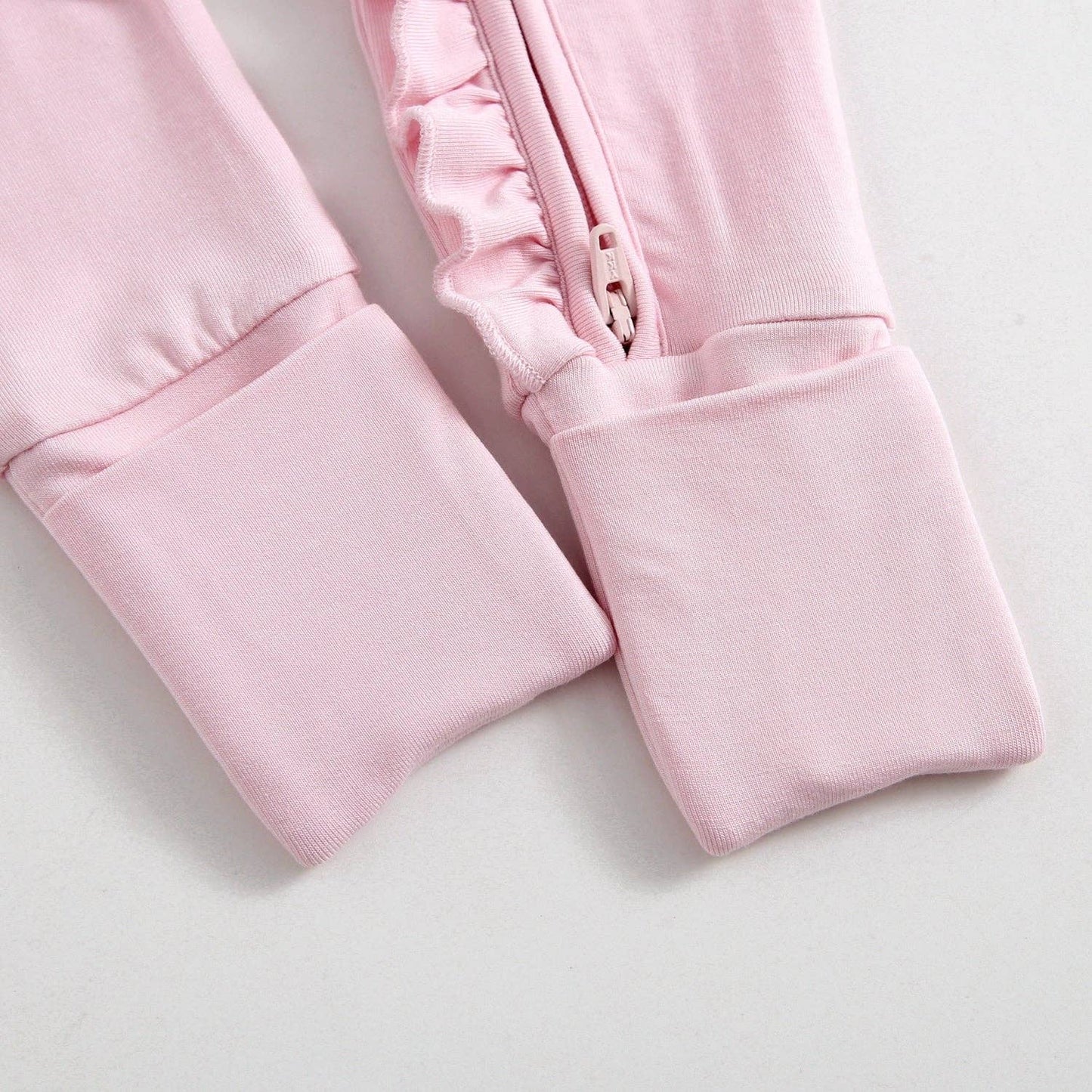 Dawn Ruffled Zippered Baby Romper | Pink