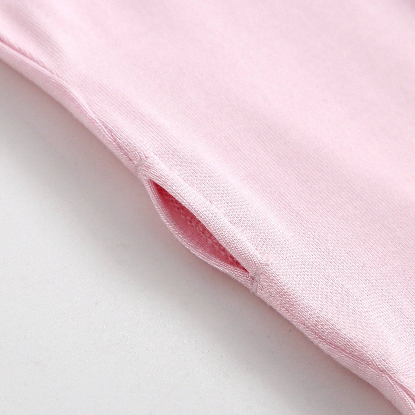 Dawn Ruffled Zippered Baby Romper | Pink
