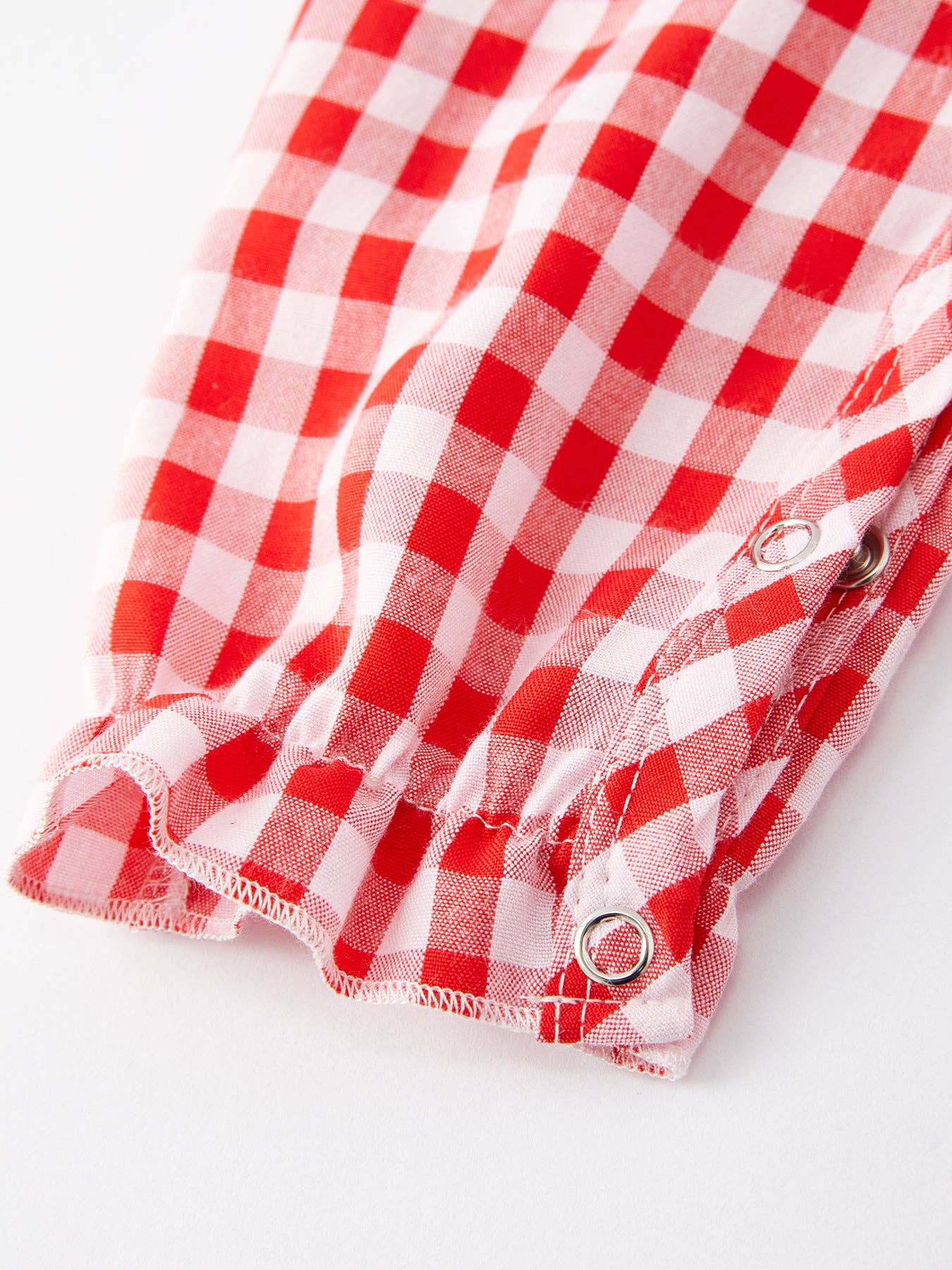 Heart & Bow Smocking Embroidered Plaid Romper