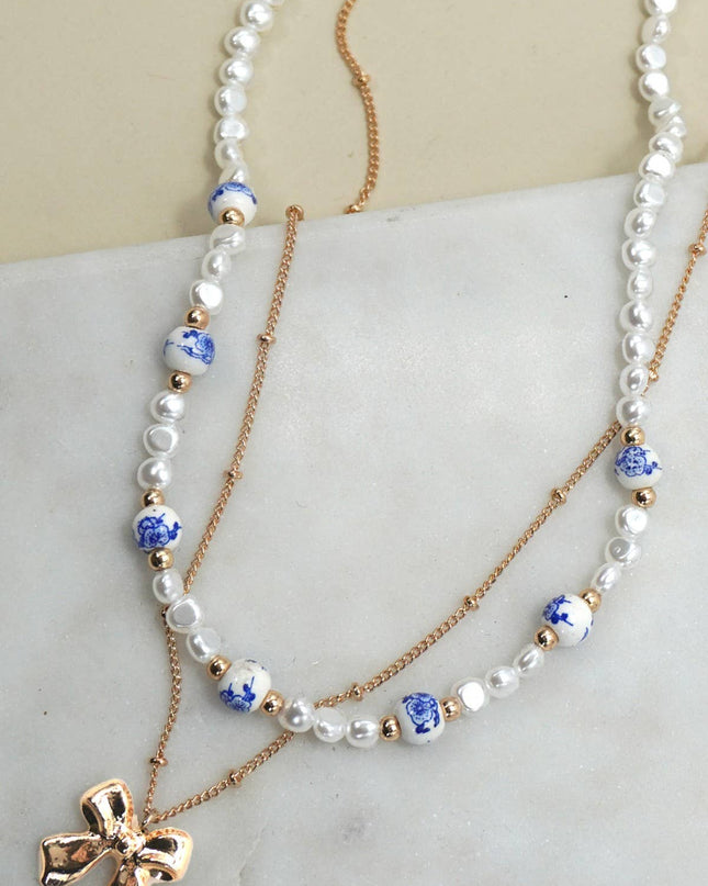 Porcelain Pearl + Gold Bow Necklace